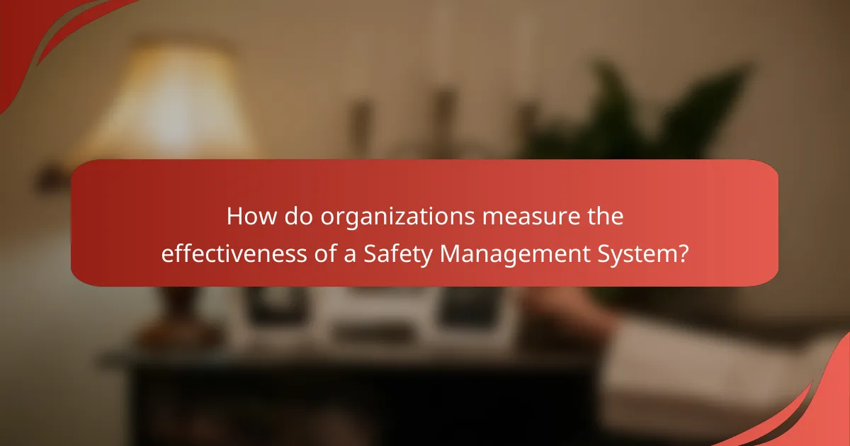 How do organizations measure the effectiveness of a Safety Management System?